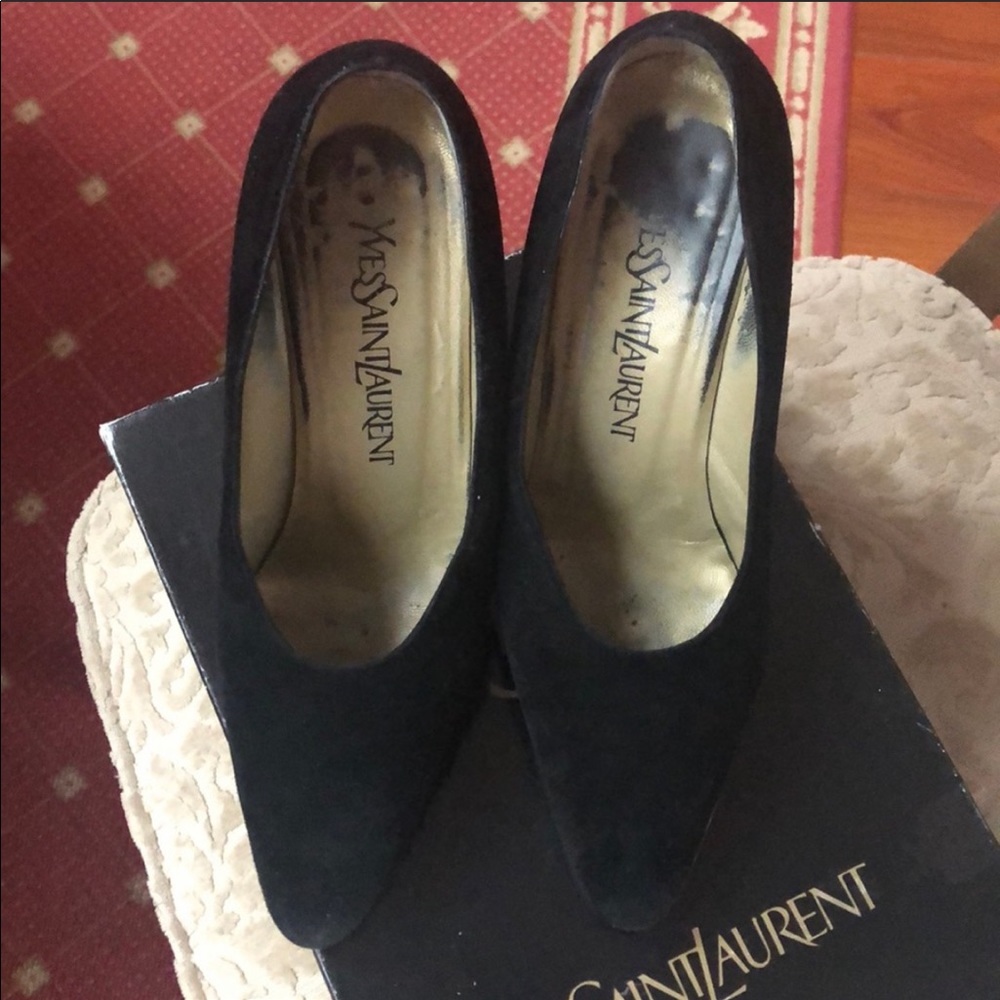 Yves Saint Laurent black suede pumps.